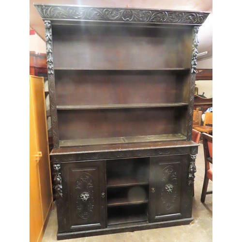 3 - 19th century heavily carved dark oak open bookcase with two cupboard doors. Approx. 229cm H x 154cm ... 