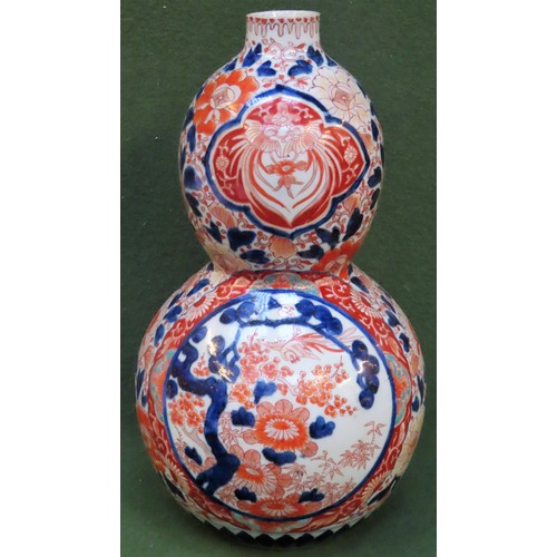 20 - 19th century Oriental glazed ceramic double gourd vase, handpainted in the imari palette. Approx. 39... 