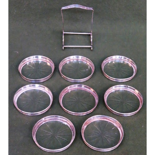 302 - Set of Eight drinks coasters, with piercework stand, stamped 'W. Sterling'