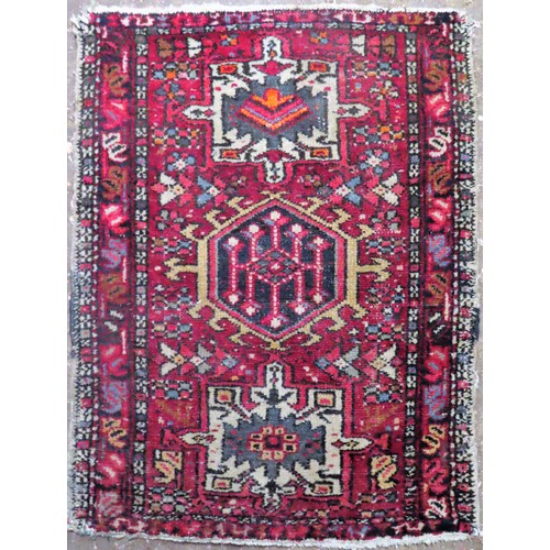 29 - Small Middle Eastern style floor rug. Approx. 80 x 59cm