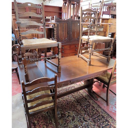 77 - Mid 20th century carved oak refectory style breakfast table, plus six (4+2) rush seated chairs. Appr... 