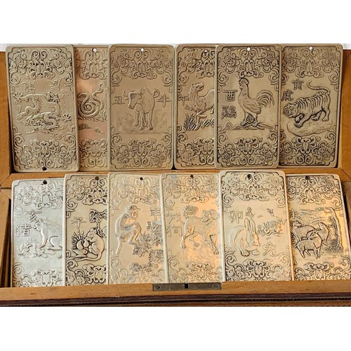 123 - TWELVE CHINESE VINTAGE SILVER COLOURED ZODIAC PLAQUES