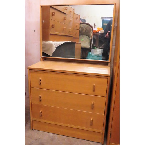87 - Stag mid 20th century three drawer chest, with mirrored top section. Approx. 129cms H x 76cms W x 44... 