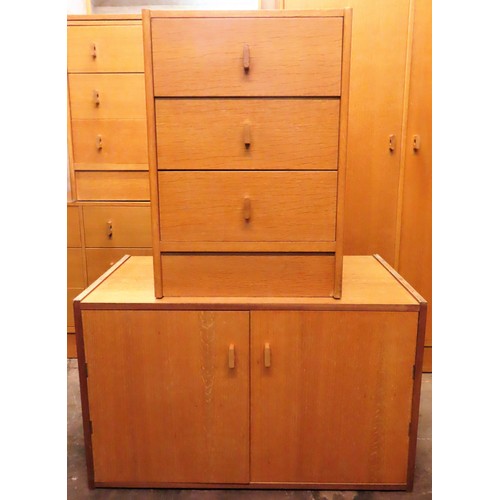 90 - Stag mid 20th century light oak three drawer bedside chest, plus two door cupboard