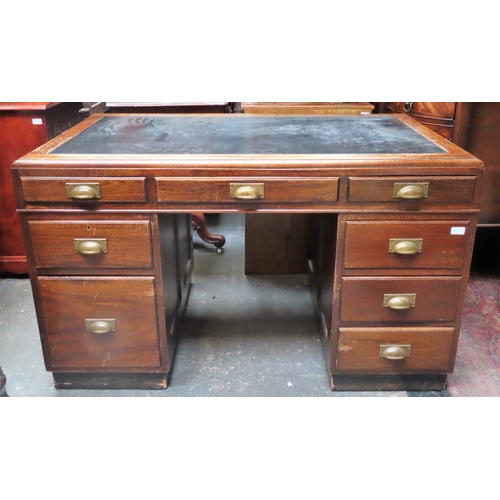 102 - Early 20th century oak eight drawer pedestal writing desk with leather effect insert. Approx. 79cms ... 