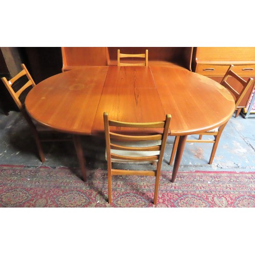 117 - G Plan mid 20th century Teak extending dining table with fold out leaf, plus four German dining chai... 