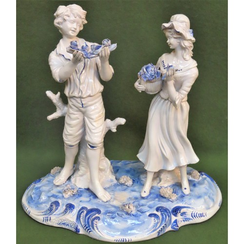 86 - Capodimonte large blue and white glazed ceramic figure group. Approx. 37cm H