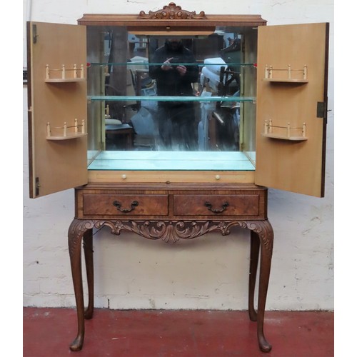 31 - Mid 20th century carved Walnut cocktail cabinet with fitted interior. App. 160cm H x 85cm W x 42cm D