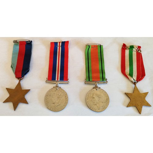 263 - SET OF FOUR WORLD WAR TWO MEDALS COMPRISING OF THE 1939-1945 STAR, THE ITALY STAR, THE DEFENCE STAR,... 