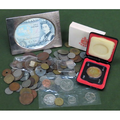 266 - Cased Canadian dollar, framed five pound note, plus large quantity of various British and other coin... 