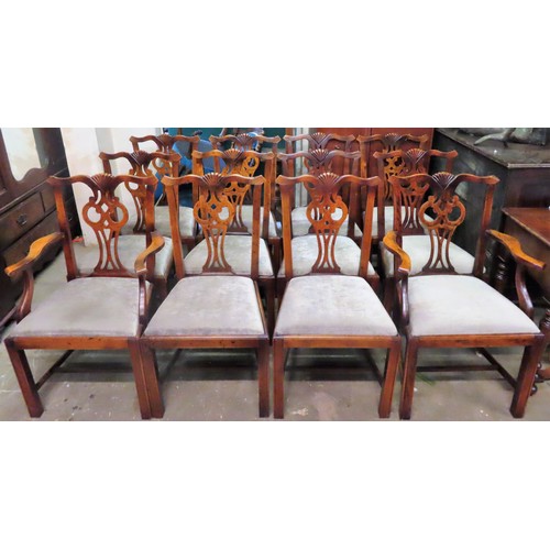 18 - Set of twelve (10 + 2) late 19th/early 20th century carved oak piercework decorated dining chairs. A... 