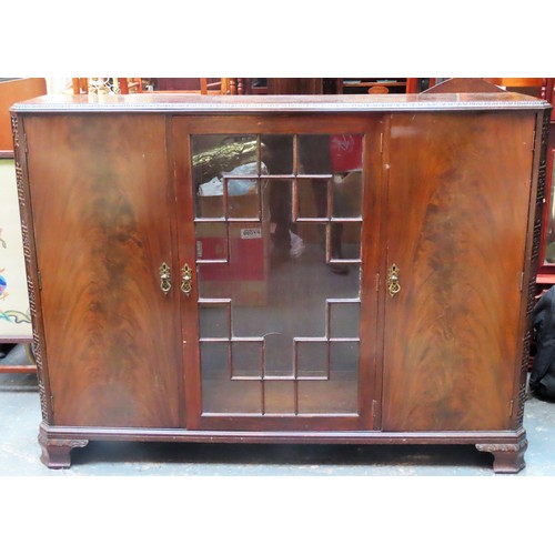 33 - Early 20th century walnut/mahogany three door bookcase. Approx. 114cms H x 153cms W x 36cms D