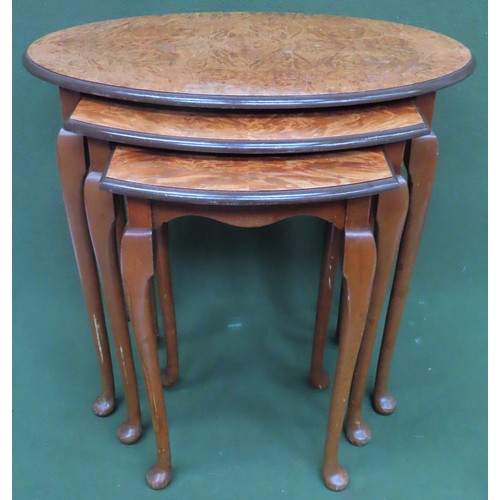 114 - 20th century walnut veneered oval nest of three tables. Approx. 55cms H x 61cms W x 44cms D