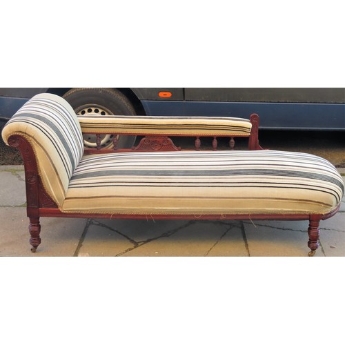 18 - Victorian/Edwardian carved mahogany upholstered chaise longue. App. 73cm H x 170cm W x 65cm D