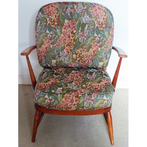 78 - Ercol mid 20th century low stick back armchair. App. 76cm H x 66cm W x 60cm D