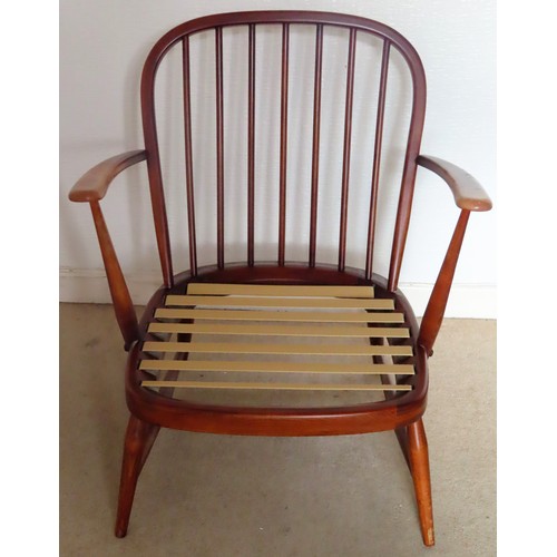 78 - Ercol mid 20th century low stick back armchair. App. 76cm H x 66cm W x 60cm D