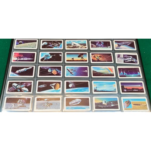 57 - Album of various brooke bond tea cards, some Canadian sets including education stamps with car + dif... 