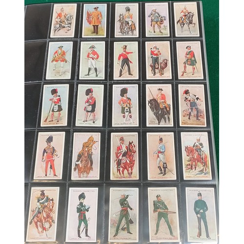 75 - Set of Players Regimental Uniforms cards with blue back, plus set of Players Regimental Uniforms car... 