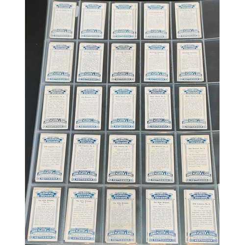 75 - Set of Players Regimental Uniforms cards with blue back, plus set of Players Regimental Uniforms car... 