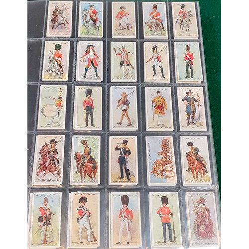 75 - Set of Players Regimental Uniforms cards with blue back, plus set of Players Regimental Uniforms car... 