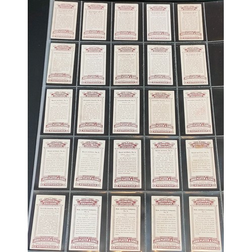 75 - Set of Players Regimental Uniforms cards with blue back, plus set of Players Regimental Uniforms car... 