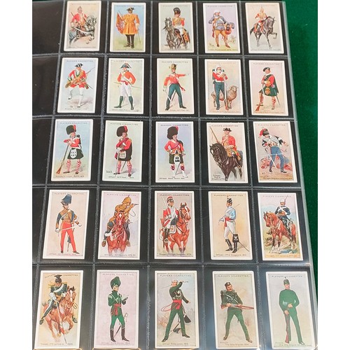 75 - Set of Players Regimental Uniforms cards with blue back, plus set of Players Regimental Uniforms car... 