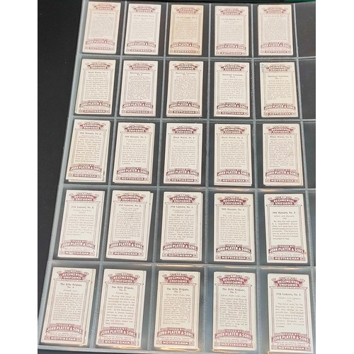 75 - Set of Players Regimental Uniforms cards with blue back, plus set of Players Regimental Uniforms car... 