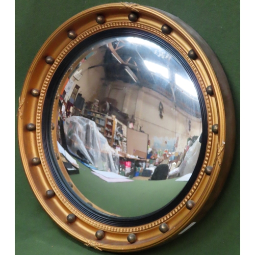 26 - 20th century gilt framed circular convex wall mirror. Approx. 52cms D