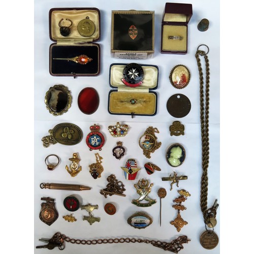 353 - Various gold coloured costume jewellery, enamelled badges, albert watch chains etc