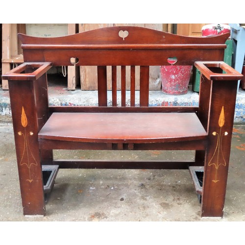 12 - Early 20th century Arts and Craft style oak hall bench with umbrella stands to either side. App. 92c... 