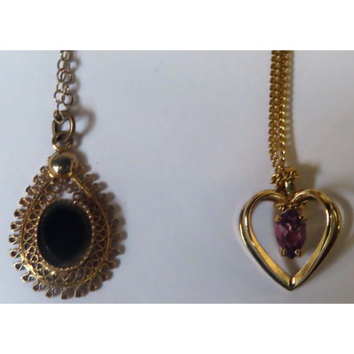 351 - RTV - gold coloured heart form pendant set with purple Amethyst coloured stone, on gold coloured cha... 