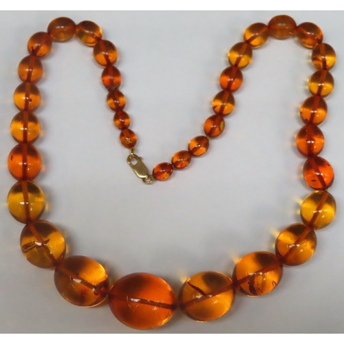 355 - RTV - Strand of graduated amber costume beads. Approx. 62.6g