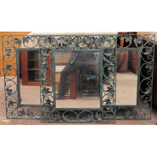 88 - Three 20th century metal framed piercework decorated wall mirrors. App. 74.5cm x 64cm