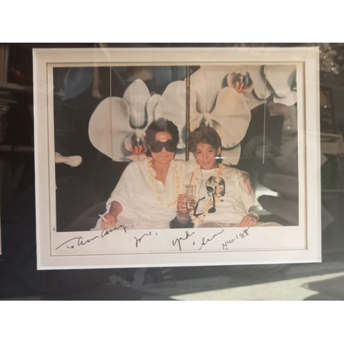 53 - Yoko Ono and Sean signed card framed and mounted with envelope and Yoko Ono promotional photograph.