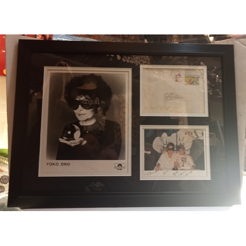 53 - Yoko Ono and Sean signed card framed and mounted with envelope and Yoko Ono promotional photograph.