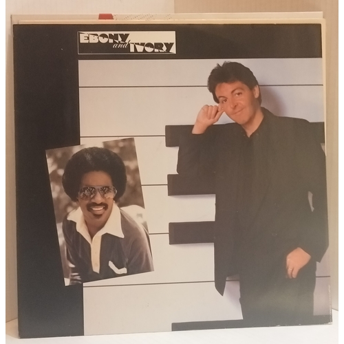 65 - A collection of records Including Paul McCartney Ebony & Ivory 12”, Paul McCartney Once Upon A Long ... 