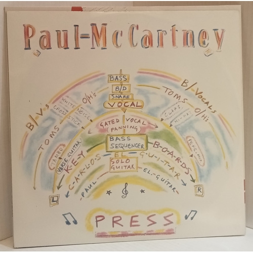 65 - A collection of records Including Paul McCartney Ebony & Ivory 12”, Paul McCartney Once Upon A Long ... 