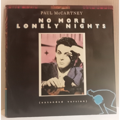 65 - A collection of records Including Paul McCartney Ebony & Ivory 12”, Paul McCartney Once Upon A Long ... 