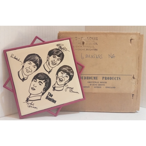 78 - The Beatles Box of Proudholme Products Tiles includes six Beatles Tiles.