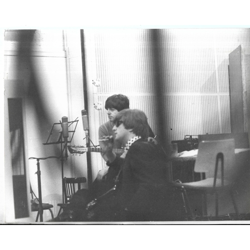 111 - Two original vintage photographs of The Beatles in Abbey Road Recording Studios during the recording... 