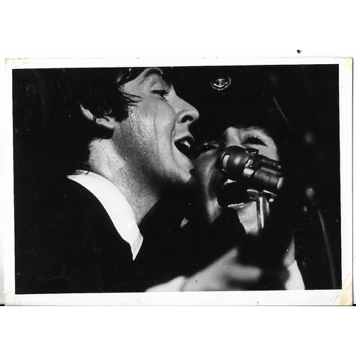 113 - An original vintage photograph of The Beatles at Atlanta August 1965. Print was formerly the propert... 