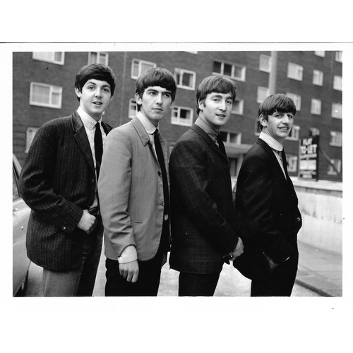 115 - Four original photographs of The Beatles, two from The Beatles Christmas Show and marked on reverse ... 