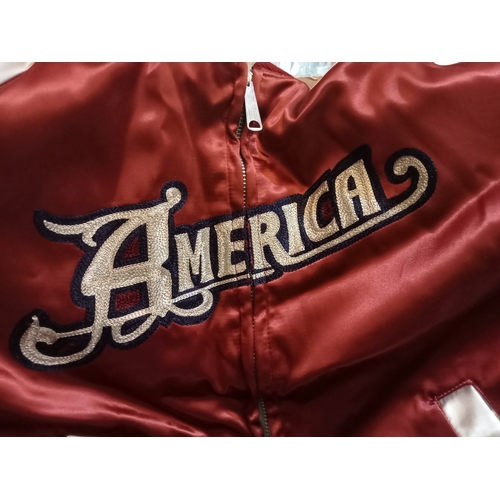 140 - A satin promotional Jacket for the group America with Geoff’s name embroidered on the pocket, with a... 