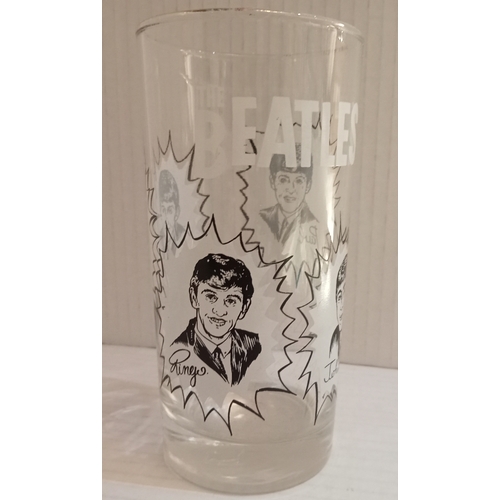 144 - The Beatles gold rimmed glass measuring 5.5