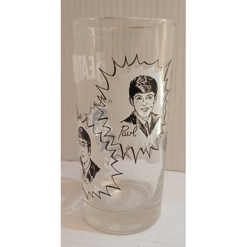 144 - The Beatles gold rimmed glass measuring 5.5