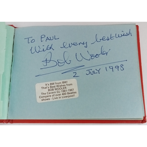 159 - Autograph book including Bob Wooler x 2, Roger McGuinn, Peter Noone, Debbie Reynolds and others.