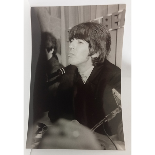 181 - Two large format photographs of George Harrison taken Hamburg 26th June 1966 by Gerd Schulthess.