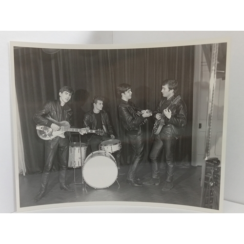 182 - The Beatles a collection of sixteen picture by Albert Marrion from the group's first photo session t... 