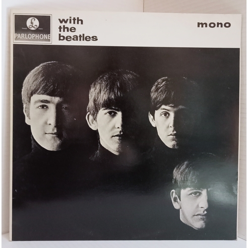 201 - A large collection of 29 Beatles and related 12” records.