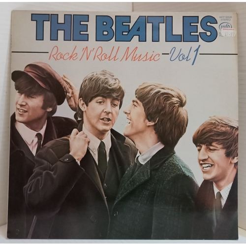 201 - A large collection of 29 Beatles and related 12” records.